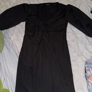 black dress medium length sleeves about above knee length